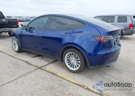 2023 Tesla Model Y Awd/Long Range Dual Motor All-Wheel Drive z USA, uszkodzony, nr VIN 7SAYGDEEXPA147884